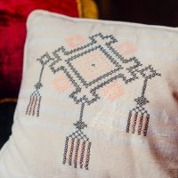 Handwoven Cushion with Embroidery - Image 3